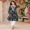 Black Chikankari kurta set for women with white floral print and lace palazzo pants