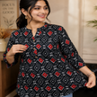 Black printed cotton kurti for women with red and white geometric prints and 3/4 sleeves