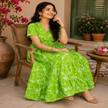 Green printed cotton midi dress for women with flowy tiered skirt