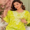 Lime green Chikankari kurta set for women with floral printed kurta and matching pants
