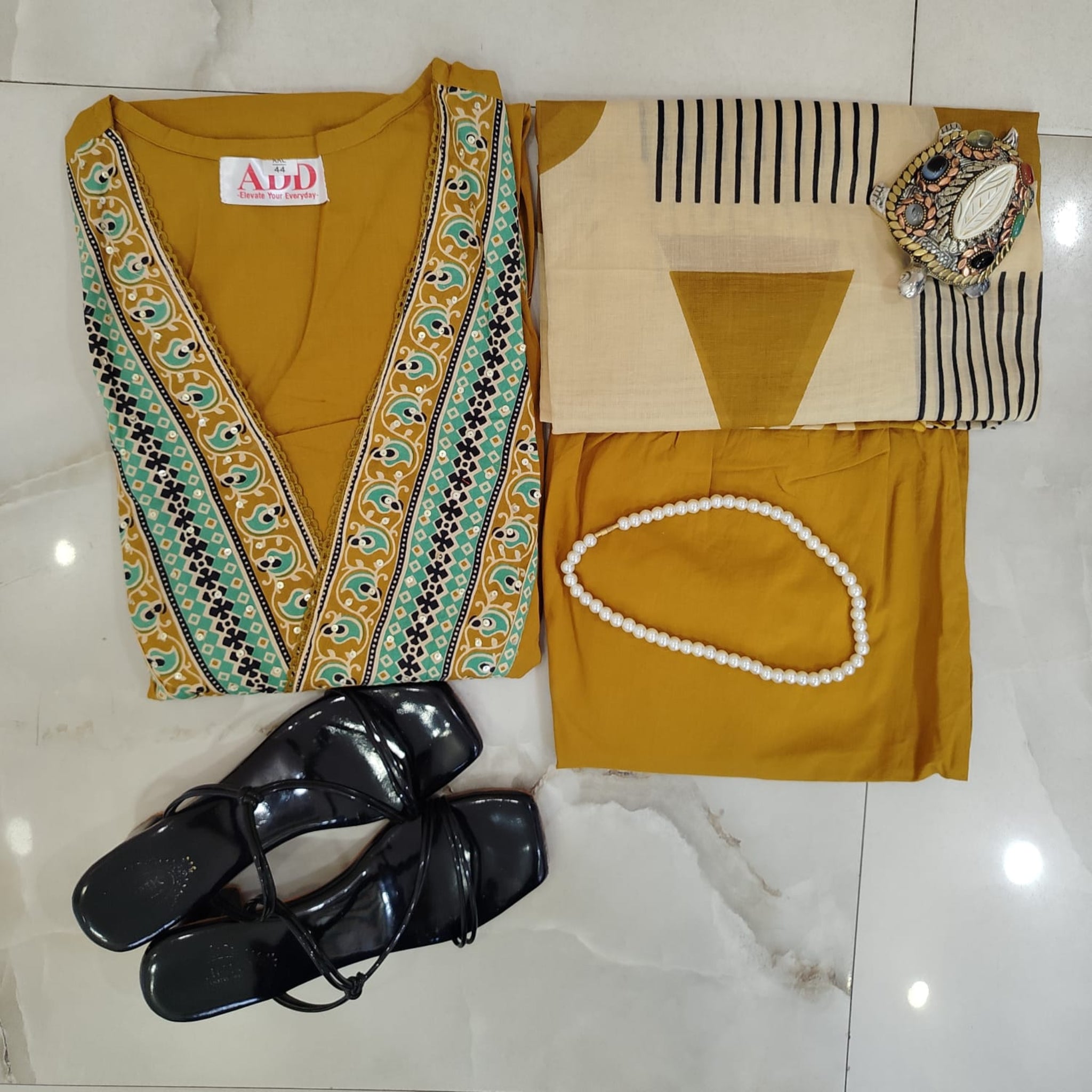 Mustard cotton printed dupatta suit for women with embroidered kurta, matching pants and Mal Mal dupatta