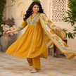 Mustard cotton printed dupatta suit for women with embroidered kurta, matching pants and Mal Mal dupatta