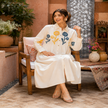 Off white cotton midi dress for women with floral applique work and long sleeves