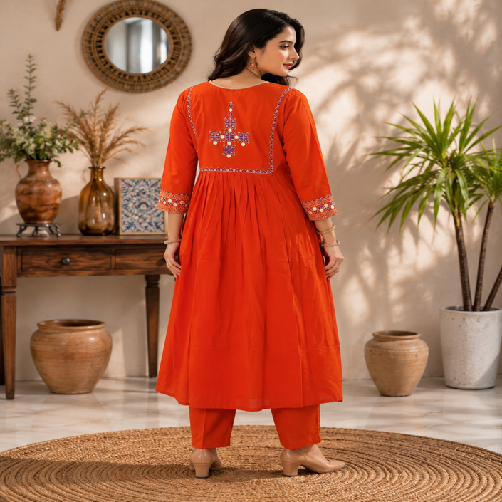 Rust orange A-line cotton kurta set for women with embroidered kurta and straight-fit pants