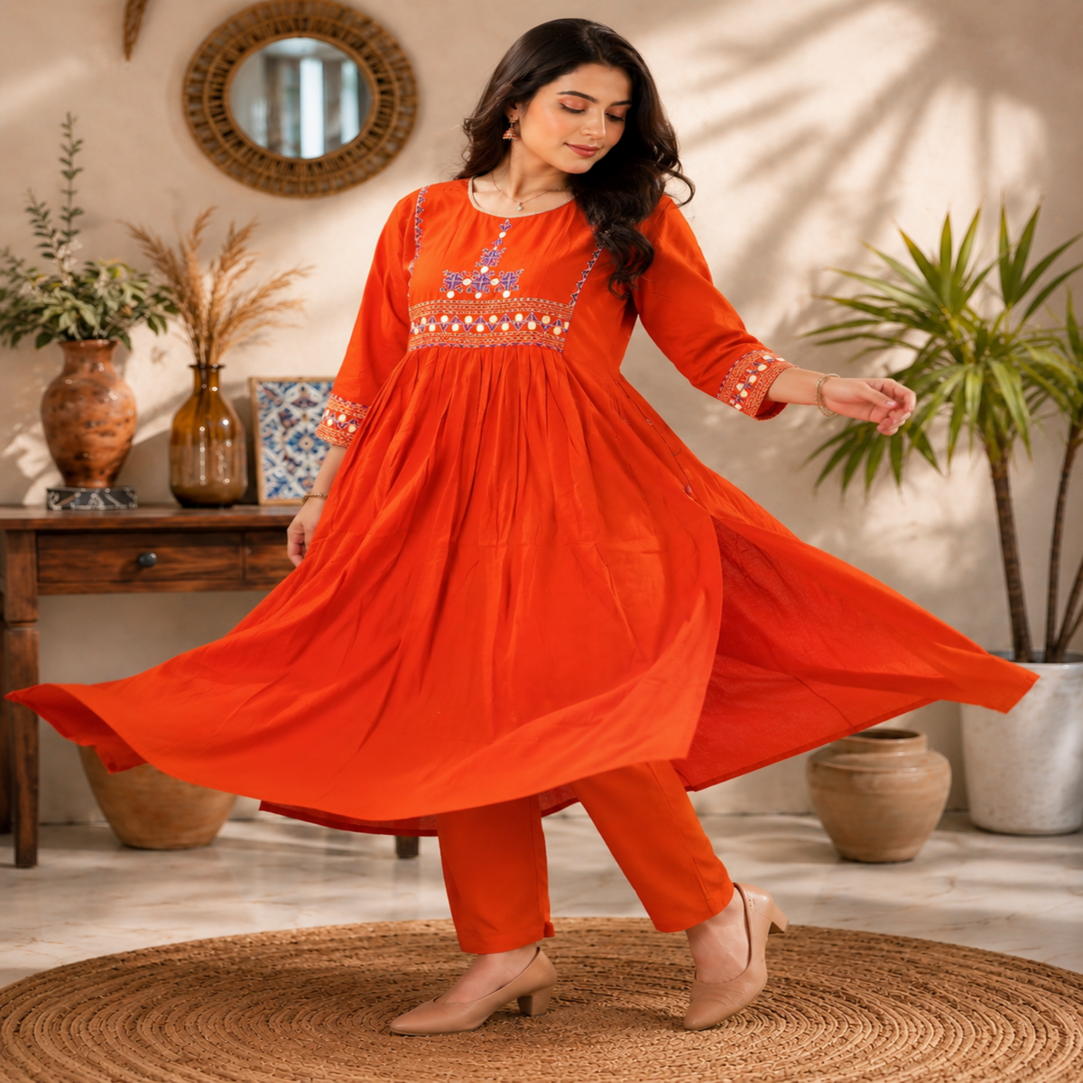 Rust orange A-line cotton kurta set for women with embroidered kurta and straight-fit pants