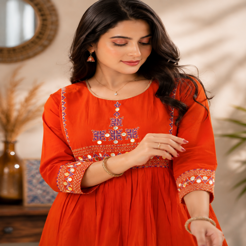 Rust orange A-line cotton kurta set for women with embroidered kurta and straight-fit pants