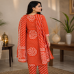 Orange Bandhej cotton suit set for women with printed kurta, straight pants and matching dupatta