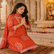 Orange Bandhej cotton suit set for women with printed kurta, straight pants and matching dupatta