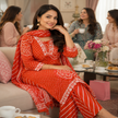 Orange Bandhej cotton suit set for women with printed kurta, straight pants and matching dupatta
