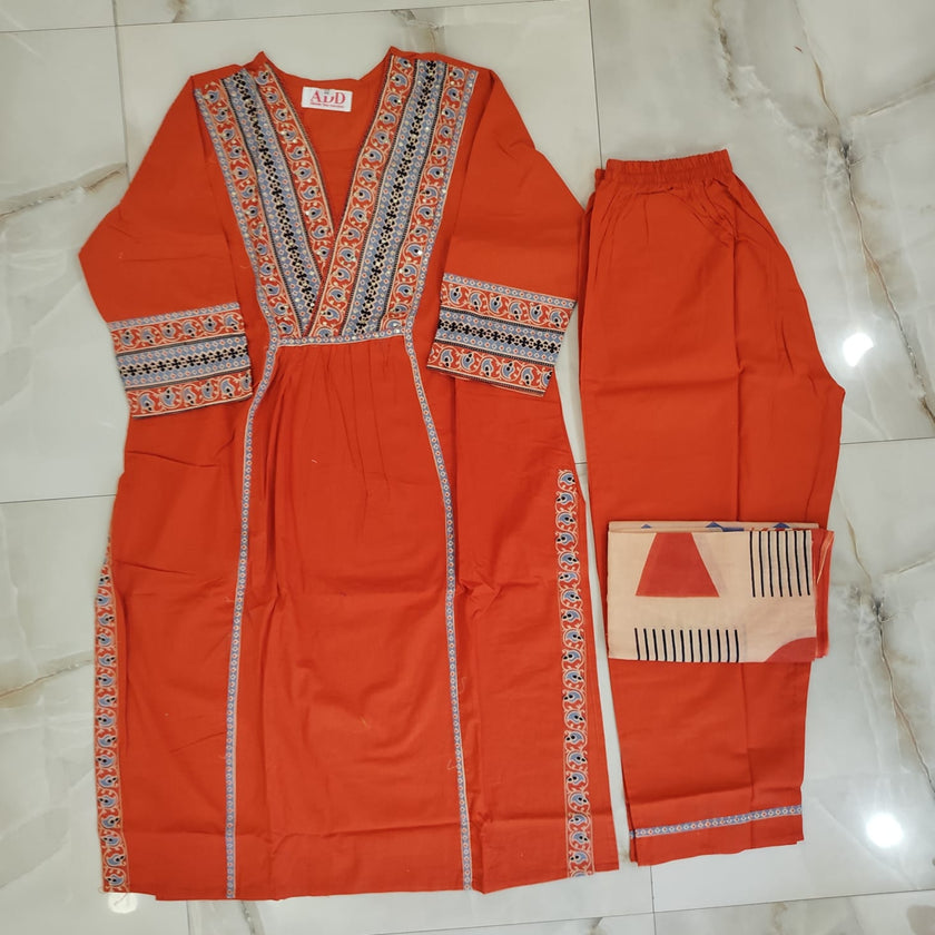 Rust cotton printed dupatta suit for women with embroidered kurta, matching pants and Mal Mal dupatta