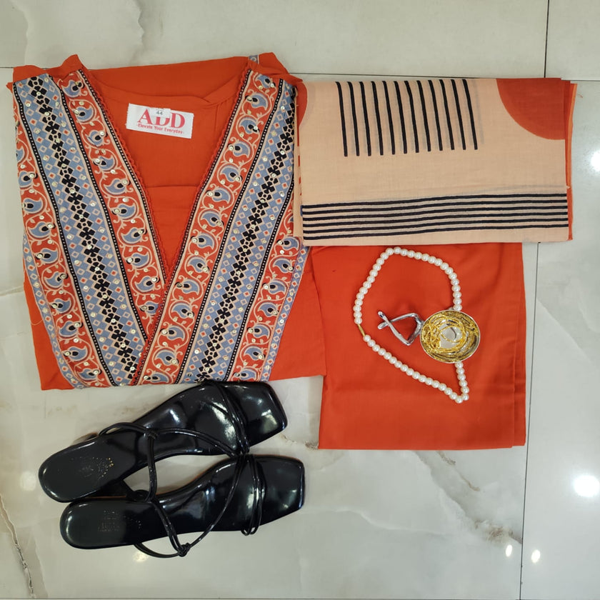 Rust cotton printed dupatta suit for women with embroidered kurta, matching pants and Mal Mal dupatta