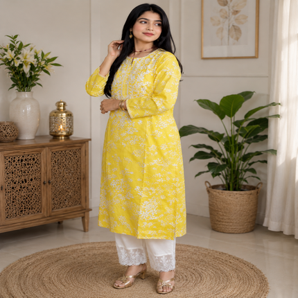 Yellow Chikankari kurta set for women with white floral print and lace palazzo pants