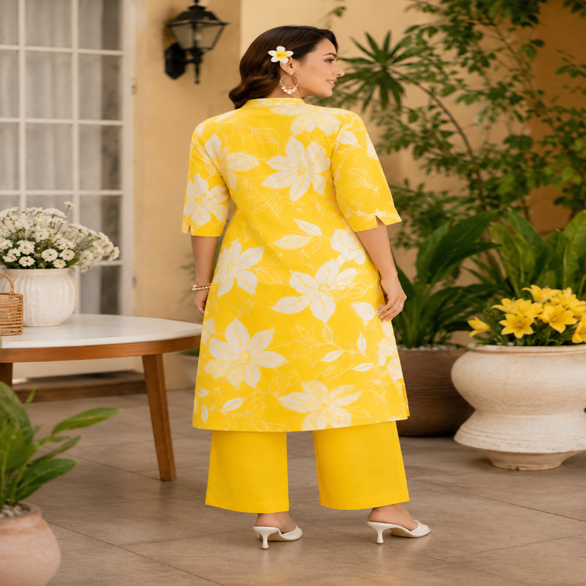 Yellow floral cotton kurta set for women with printed kurta and matching pants