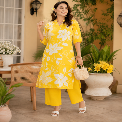 Yellow floral cotton kurta set for women with printed kurta and matching pants