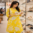 Yellow floral cotton kurta set for women with printed kurta and matching pants