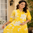 Yellow floral cotton kurta set for women with printed kurta and matching pants