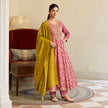 Rose pink floral Anarkali suit for women with flared kurta, matching trousers and contrasting mustard dupatta