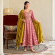 Rose pink floral Anarkali suit for women with flared kurta, matching trousers and contrasting mustard dupatta