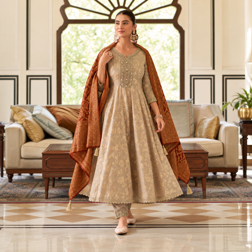 Royal beige gold Anarkali suit for women with flared kurta, matching trousers and contrasting maroon dupatta