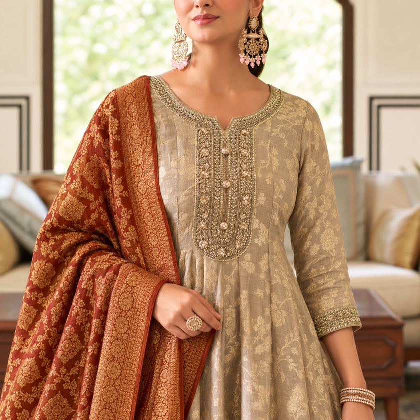 Royal beige gold Anarkali suit for women with flared kurta, matching trousers and contrasting maroon dupatta