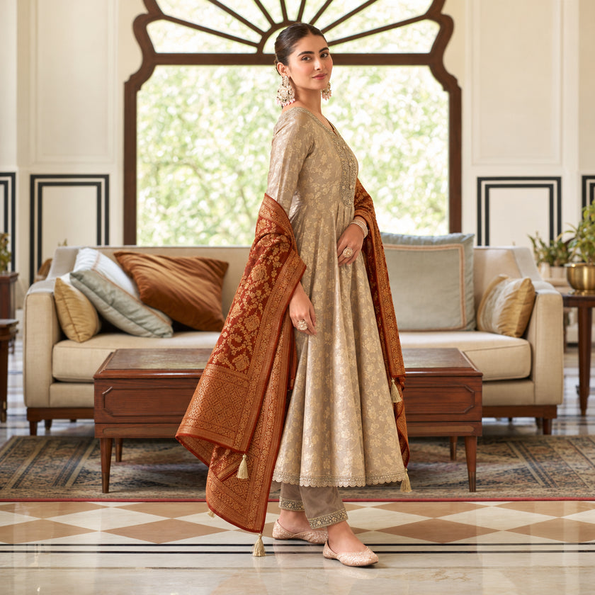 Royal beige gold Anarkali suit for women with flared kurta, matching trousers and contrasting maroon dupatta