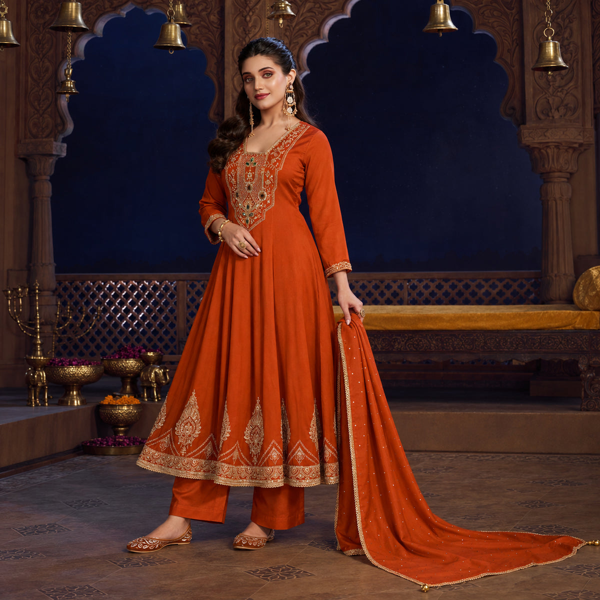 Rust orange royal embroidered Anarkali suit for women with flared kurta, matching wide-leg trousers and coordinating dupatta
