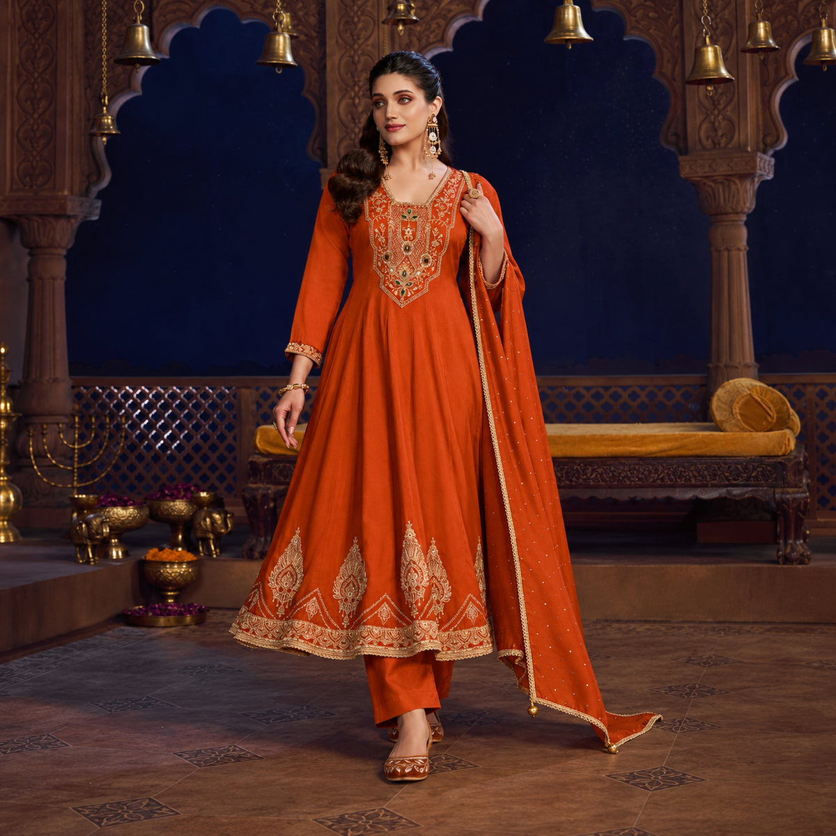 Rust orange royal embroidered Anarkali suit for women with flared kurta, matching wide-leg trousers and coordinating dupatta
