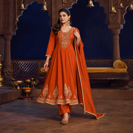 Rust orange royal embroidered Anarkali suit for women with flared kurta, matching wide-leg trousers and coordinating dupatta