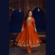 Rust orange royal embroidered Anarkali suit for women with flared kurta, matching wide-leg trousers and coordinating dupatta